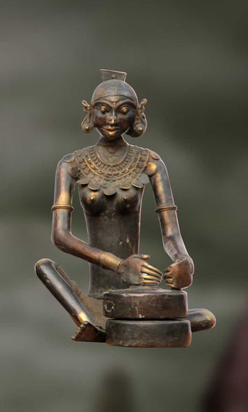 Bhujambu:Grinding of wheat