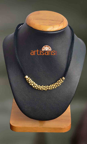 Tribal Jewellery: Golden Colored Round Beads on Black Thread