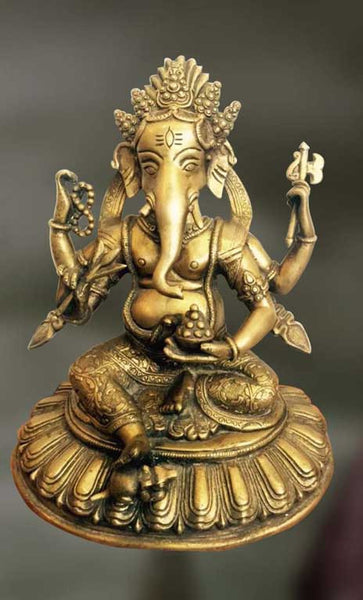 Brass sculpture of Ganesha with four divine arms 
