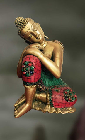 Brass and Stone sculpture of Buddha in a relaxed posture 