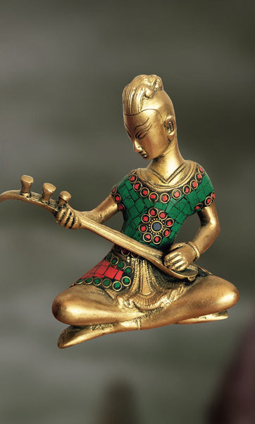 Brass and Stone Sculpture of man playing veena 