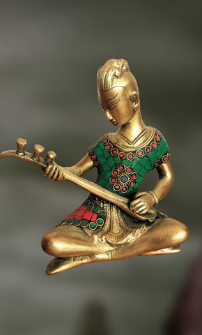 Brass and Stone Sculpture of man playing veena 