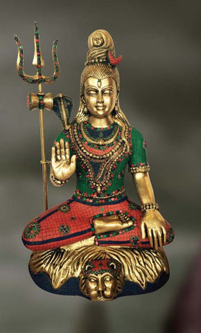 Brass and Stone Sculpture of Shiva sitting on a pedestal