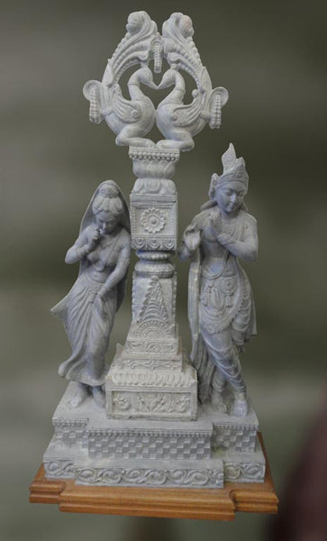 Handmade sandstone sculpture of Radha and Krishna