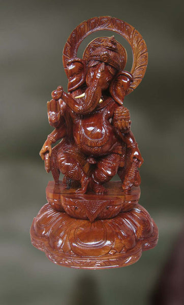 Wood sculpture of dancing Ganesha