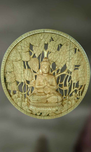 Wall hanging of Lord Buddha in Dharmachakra mudra